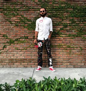 Do What You Love hand painted pants by Sergey Gordienko